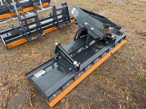 wolverine skid steer dozer blade|wolverine attachments catalog.